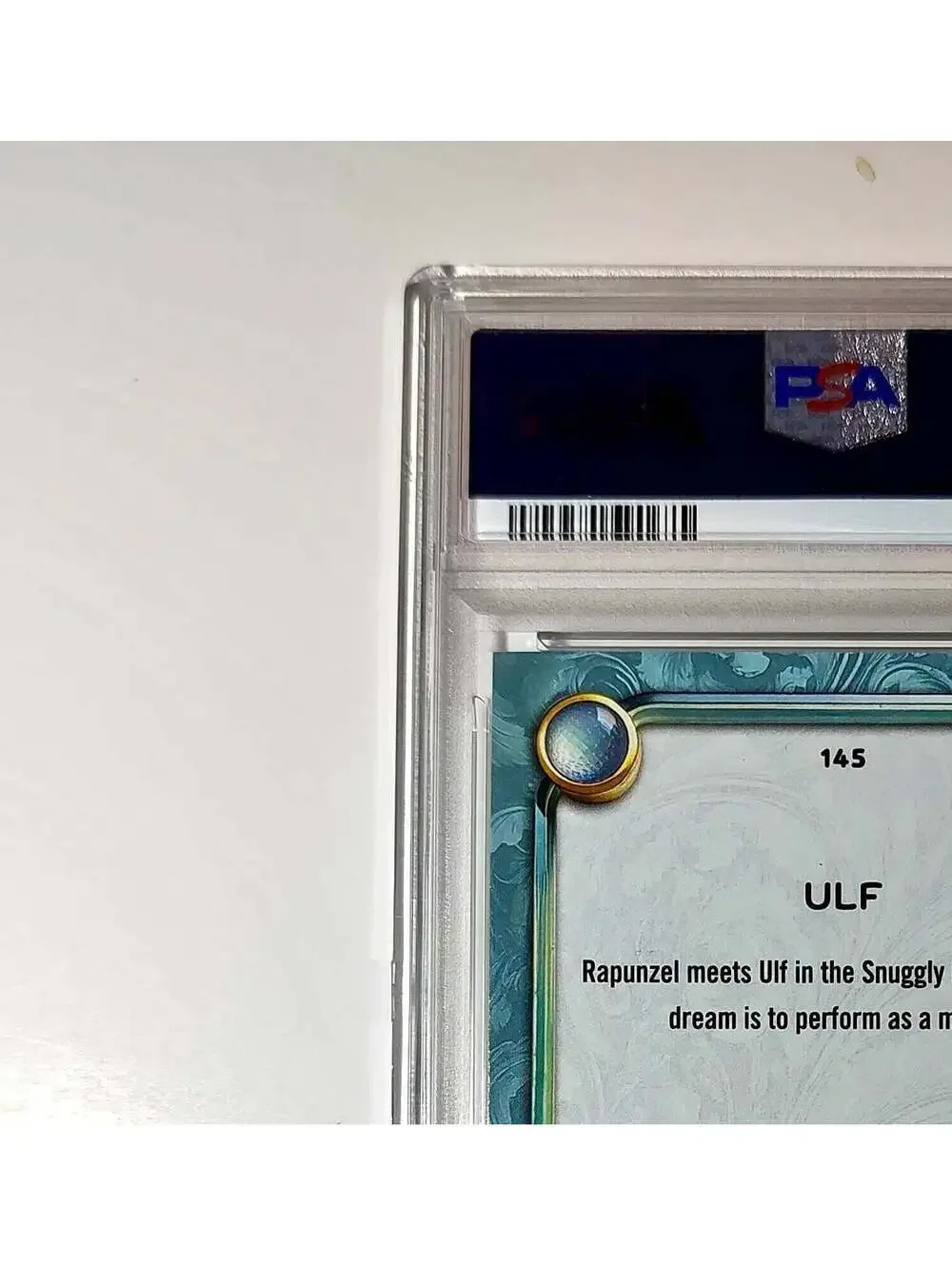 Ulf 2025 Topps Disney Wonder #145 Diamond Card Tangled PSA 9